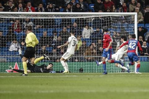 12th December 2018, Santiago Bernabeu, Madrid, Spain; UEFA Champions League football, Real Madrid versus CSKA Moscow; Georgi Akinfeev (CSK) scores to make it 0-2  ActionPlus12087187 ShotxforxPress