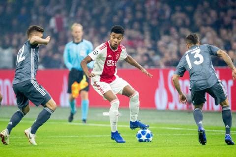 Joshua Kimmich of FC Bayern Munchen , David Neres of Ajax, Rafinha of FC Bayern Munchen during the UEFA Champions League group E match between Ajax Amsterdam and Bayern Munich at the Johan Cruijff Arena on December 12, 2018 in Amsterdam, The Netherlands UEFA Champions League 2018 2019 xVIxVIxImagesx xTomxBodexMultimediaxIVx 13054195