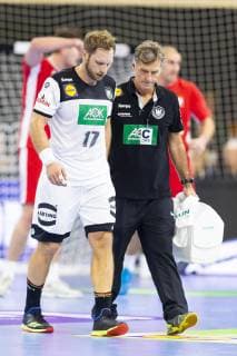 Steffen Weinhold No 17 Germany is accompanied by Peter Graeschus Germany vs Poland Handball Test match 12 12 18 Rostock Mecklenburg Vorpommern Germany StadtHalle Copyright: xAgentur54Gradx xFelixxKoenigx