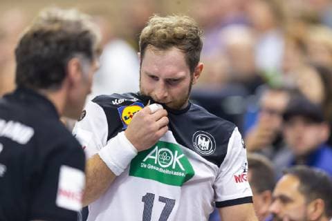 Steffen Weinhold No 17 Germany is accompanied by Peter Graeschus Germany vs Poland Handball Test match 12 12 18 Rostock Mecklenburg Vorpommern Germany StadtHalle Copyright: xAgentur54Gradx xFelixxKoenigx
