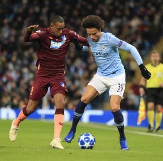 12th December 2018, Etihad Stadium, Manchester, England; UEFA Champions League football, Manchester City versus Hoffenheim; Leroy Sane of Manchester City and Joshua Brenet of Hoffenheim challenge for the ball  ActionPlus12087230 ConorxMolloy