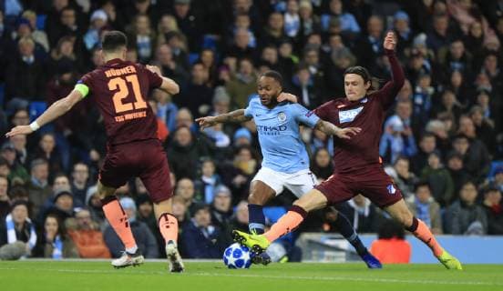 12th December 2018, Etihad Stadium, Manchester, England; UEFA Champions League football, Manchester City versus Hoffenheim; Raheem Sterling of Manchester City and Nico Schulz of Hoffenheim challenge for the ball  ActionPlus12087231 ConorxMolloy