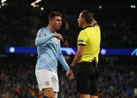 Aymeric Laporte of Manchester City argues with the referee during the UEFA Champions League Group F match at the Etihad Stadium, Manchester. Picture date 12th December 2018. Picture credit should read: Simon Bellis Sportimage EDITORIAL USE ONLY. No use with unauthorised audio, video, data, fixture lists, club league logos or live services. Online in-match use limited to 120 images, no video emulation. No use in betting, games or single club league player publications.