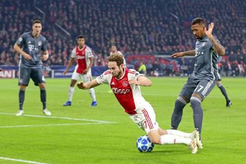 AMSTERDAM, Ajax - Bayern Munchen, football, Champions League Season 2018 2019, 12-12-2018, Johan Cruijff Arena . Ajax player Daley Blind (L) and Bayern Munchen player Jerome Boateng (R) during the game Ajax - Bayern . Ajax - Bayern  x2685445x