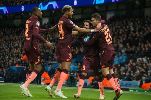 Manchester City v TSG 1899 Hoffenheim UEFA Champions League Team mates mob Andrej Kramaric of TSG (far right) after he scores a penalty kick for his sides first goal during the UEFA Champions League match at the Etihad Stadium, Manchester Content Not Available For UK Newspapers Copyright: xMattxWilkinsonx FIL-12681-0022