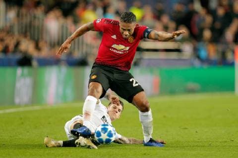 Valencia CF s Santi Mina (L) vies for the ball with Manchester s Antonio Valencia during a UEFA Champions League soccer match between Valencia CF and Manchester United ManU at Mestalla stadium in Valencia, Spain, 12 December 2018. Valencia CF vs Manchester United !ACHTUNG: NUR REDAKTIONELLE NUTZUNG!  Copyright: xKaixForsterlingx GRAFCVA874 20181212-636802479356600906