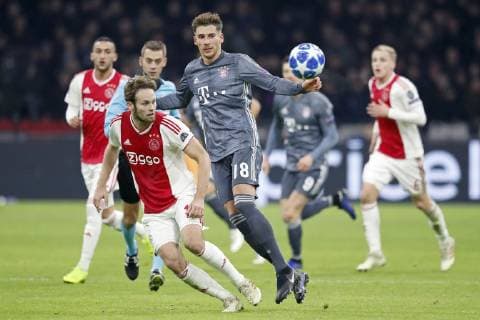 AMSTERDAM, Ajax - Bayern Munchen, football, Champions League Season 2018 2019, 12-12-2018, Johan Cruijff Arena . Ajax player Daley Blind (L) and Bayern Munchen player Leon Goretzka (R) during the game Ajax - Bayern . Ajax - Bayern  x2685579x