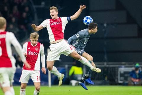 Matthijs de Ligt of Ajax, Robert Lewandowski of FC Bayern Munchen during the UEFA Champions League group E match between Ajax Amsterdam and Bayern Munich at the Johan Cruijff Arena on December 12, 2018 in Amsterdam, The Netherlands UEFA Champions League 2018 2019 xVIxVIxImagesx xTomxBodexMultimediaxIVx 13054508