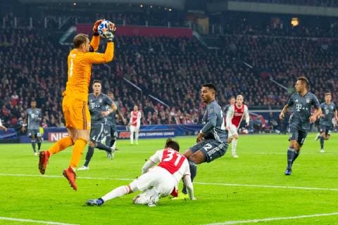goalkeeper Manuel Neuer of FC Bayern Munchen, Nico Tagliafico of Ajax, Joshua Kimmich of FC Bayern Munchen during the UEFA Champions League group E match between Ajax Amsterdam and Bayern Munich at the Johan Cruijff Arena on December 12, 2018 in Amsterdam, The Netherlands UEFA Champions League 2018 2019 xVIxVIxImagesx xTomxBodexMultimediaxIVx 13054558
