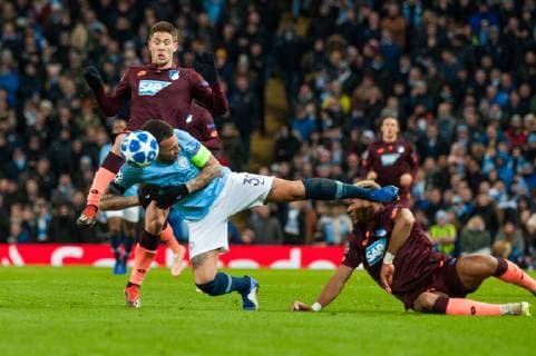 Manchester City v TSG 1899 Hoffenheim UEFA Champions League Nicolas Otamendi of Manchester City goes down under a challenge from Joelinton (right) during the UEFA Champions League match at the Etihad Stadium, Manchester Content Not Available For UK Newspapers Copyright: xMattxWilkinsonx FIL-12681-0024