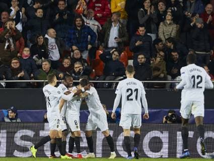 12th December 2018, Mestalla Stadium, Valencia, Spain; UEFA Champions League football, Valencia versus Manchester United ManU Carlos Soler of Valencia CF celebrates with his team mates after scoring in minute 17 the first goal for his team 1-0  ActionPlus12087236 IvanxArlandis