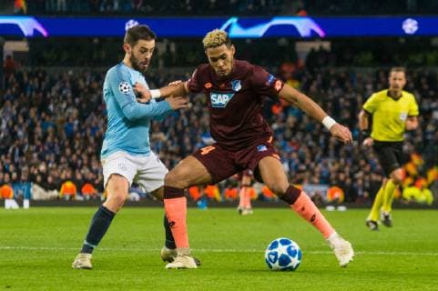 Manchester City v TSG 1899 Hoffenheim UEFA Champions League Joelinton of TSG 1899 Hoffenheim holds the ball up from Bernardo Silva of Manchester City during the UEFA Champions League match at the Etihad Stadium, Manchester Content Not Available For UK Newspapers Copyright: xMattxWilkinsonx FIL-12681-0030