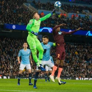 Manchester City v TSG 1899 Hoffenheim UEFA Champions League Manchester City goalkeeper Ederson punches clear from Joshua Brenet of TSG 1899 Hoffenheim during the UEFA Champions League match at the Etihad Stadium, Manchester Content Not Available For UK Newspapers Copyright: xMattxWilkinsonx FIL-12681-0031