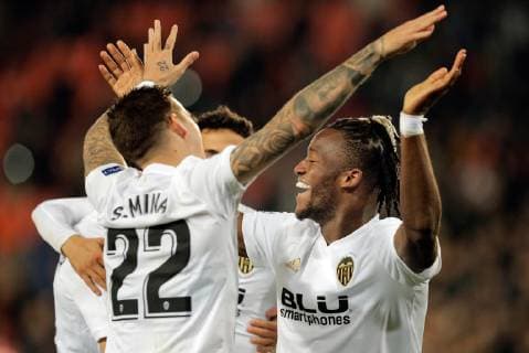 Valencia CF s Geoffrey Kondogbia (R) and Santi Mina (L) celebrate a goal during a UEFA Champions League soccer match between Valencia CF and Manchester United ManU at Mestalla stadium in Valencia, Spain, 12 December 2018. Valencia CF vs Manchester United !ACHTUNG: NUR REDAKTIONELLE NUTZUNG!  Copyright: xKAIxFORSTERLINGx GRAFCVA880 20181212-636802498620109036