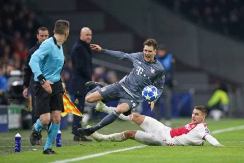 12 12 2018 Football UEFA Champions League 2018 2019 Group stage 6 matchday Ajax Amsterdam FC Bayern Munich at Johan Cruijff Arena Amsterdam L R Leon Goretzka Bayern Munich is being fouled by Maximilian Wöber Ajax Amsterdam DFL and DFB regulations prohibit any use of photographs as image sequences and or quasi video