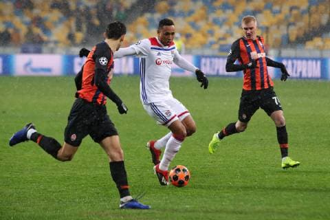 Defender Kenny Tete (C) of Olympique Lyonnais (Lyon) is seen in action with midfielders Taras Stepanenko (L) and Viktor Kovalenko of FC Shakhtar Donetsk during the UEFA Champions League Group F Matchday 6 game at the NSC Olimpiyskiy, Kyiv, capital of Ukraine, December 12, 2018. Ukrinform. UCL: Shakhtar vs Lyon in Kyiv  Copyright: xPavlo_Bagmutx
