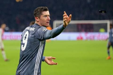AMSTERDAM, Ajax - Bayern Munchen, football, Champions League Season 2018 2019, 12-12-2018, Johan Cruijff Arena . Bayern Munchen player Robert Lewandowski throws away a lighter during the game Ajax - Bayern . Ajax - Bayern  x2685950x