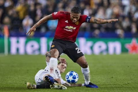 12th December 2018, Mestalla Stadium, Valencia, Spain; UEFA Champions League football, Valencia versus Manchester United ManU Luis Antonio Valencia of Manchester United tackled by Santi Mina of Valencia CF  ActionPlus12087260 IvanxArlandis