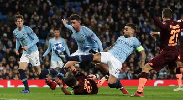 Football - 2018 2019 UEFA Champions League - Group F: Manchester City vs. 1899 Hoffenheim Florian Grillitsch of Hoffenheim is fouled by Aymeric Laporte of Manchester City for a penalty at The Etihad. COLORSPORT LYNNE CAMERON 