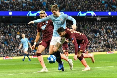 Manchester City TSG 1899 Hoffenheim Manchesters Stones John No 5 against Hoffenheims Joelinton No 34 and Hoffenheims Leonardo Bittencourt No 13 at the Champions League match Manchester City TSG 1899 Hoffenheim Manchester 12 12 18 Football Champions League Manchester