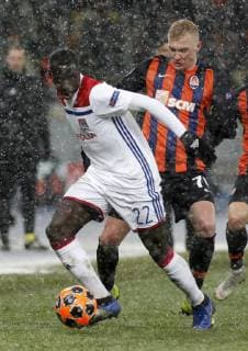 December 13, 2018 - Kyiv, Ukraine - Fernando MaroÂßal (L) of Lyon vies for the ball with Viktor Kovalenko (R) of Shakhtar during the UEFA Champions League Group F football match between Shakhtar Donetsk and Lyon at the NSK Olimpiyskyi in Kyiv, Ukraine, December 12, 2018. UEFA Champions League 2018: Group F: Shakhtar 1:1 Lyon - ZUMAs334 87573208st Copyright: xAnatoliixStepanovx