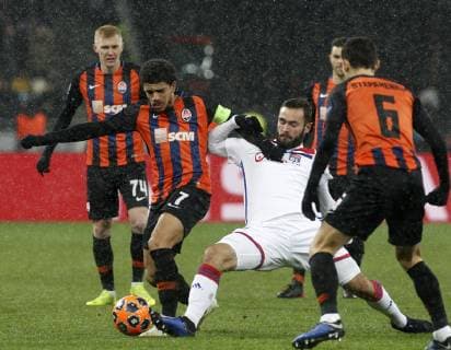 December 12, 2018 - Kyiv, Ukraine - Lucas Tousart (R) of Lyon vies for the ball with Taison (L) of Shakhtar during the UEFA Champions League Group F football match between Shakhtar Donetsk and Lyon at the NSK Olimpiyskyi in Kyiv, Ukraine, December 12, 2018. UEFA Champions League 2018: Group F: Shakhtar 1:1 Lyon - ZUMAs334 87573236st Copyright: xAnatoliixStepanovx