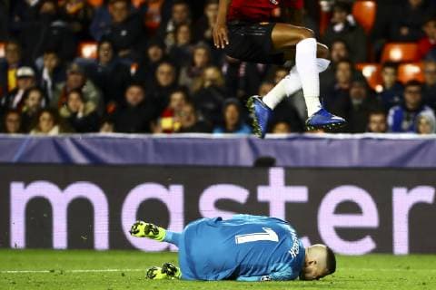 December 12, 2018 - Valencia, Spain - Jaume Domenech of Valencia CF (B) and Marcus Rashford of Manchester United ManU jups during UEFA Champions League Group H between Valencia CF and Manchester United at Mestalla stadium on December 12, 2018. ( NurPhoto) Valencia v Manchester United - UEFA Champions League Group H  - ZUMAn230 20181212_zaa_n230_545 Copyright: xJosexMiguelxFernandezx