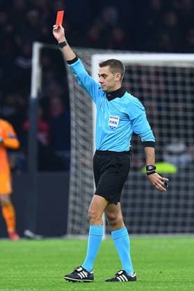 Football Champions League Group Phase 6 Matchday Ajax Amsterdam FC Bayern Munich on 12 12 2018 in the Johann Cruyff ArenA in Amsterdam FIFA referee Clement Turpin France shows Thomas Müller Munich the red card DFL Regulations prohibit any use of photographs as image sequences and or quasi video xRx