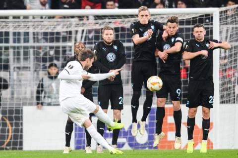 181213 Dorukhan Toköz of Besiktas with a free kick while Fouad Bachiroum Lasse Nielsen Markus Rosenberg and Marcus Antonsson of Malmö FF defends during the Europa league match between Besiktas and Malmö FF on December 13 2018 in Istanbul Photo Petter Arvidson BILDBYR u0081N kod PA 92175, detectedSourceLanguage  Copyright: PETTERxARVIDSON BB181213PA024