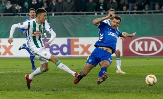 SOCCER - UEFA EL, Rapid vs Rangers VIENNA,AUSTRIA,13.DEC.18 - SOCCER - UEFA Europa League, group stage, SK Rapid Wien vs Glasgow Rangers. Image shows Dejan Ljubicic (Rapid) and Gareth McAuley (Rangers). Keywords: Wien Energie. GEPAxpictures xMarioxKneisl
