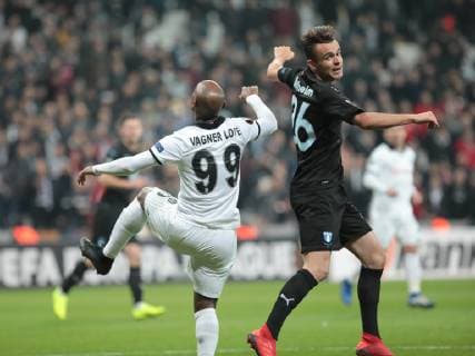 Vagner Love of Besiktas and Andreas Vindheim (R) of Malmo during the UEFA Europa League match between Besiktas and Malmo at Vodafone Park in Istanbul , Turkey on December 13 , 2018. 
