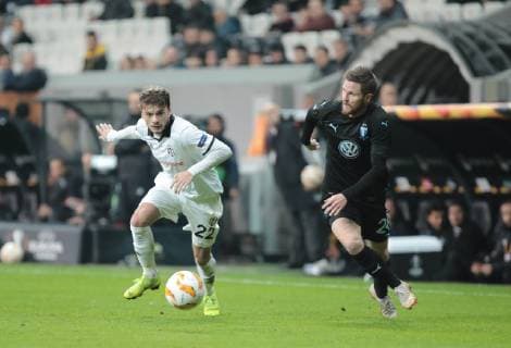 Adem Ljajic (L) of Besiktas and Lasse Nielsen (R) of Malmo during the UEFA Europa League match between Besiktas and Malmo at Vodafone Park in Istanbul , Turkey on December 13 , 2018. 