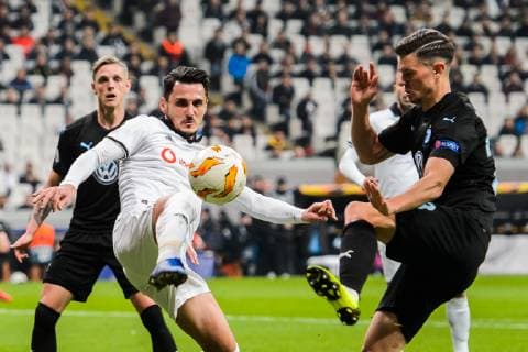 181213 Mustafa Pektemek or Besiktas and Marcus Antonsson of Malmö FF during the Europe league match between Besiktas and Malmö FF on December 13, 2018 in Istanbul Photo Petter Arvidson BILDBYR N Code PA 92175, detectedSourceLanguage  Copyright: PETTERxARVIDSON BB181213PA102
