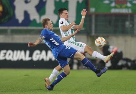 SOCCER - UEFA EL, Rapid vs Rangers VIENNA,AUSTRIA,13.DEC.18 - SOCCER - UEFA Europa League, group stage, SK Rapid Wien vs Glasgow Rangers. Image shows Scott Arfield (Rangers) and Thomas Murg (Rapid). Keywords: Wien Energie. GEPAxpictures xChristianxOrt