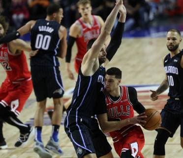 Nokola Vucevic (L) of Orlando Magic in action against Chicago Bulls Zach LaVine (R) during a NBA Basketball Herren USA basketball game between Orlando Magic and Chicago Bulls held at the Arena Mexico City, in Mexico City, Mexico, 13 December 2018. Orlando Magic vs Chicago Bulls !ACHTUNG: NUR REDAKTIONELLE NUTZUNG!  Copyright: xJorgexNúnezx GRAF6675 20181214-636803793490871450