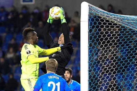 GENK, BELGIUM - DECEMBER 13 : Daniel Vukovic goalkeeper of Genk battles for the ball with Rashad Muhammed of Sarpsborg during the Europa League game between KRC Genk and Sarpsborg 08 FF on December 13, 2018 in Genk, Belgium, 13 12 2018 FOOTBALL : Ligue Europa - Genk vs Sarpsborg - 13 12 2018 PhotoNews panoramic 