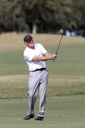 ORLANDO, FL - DECEMBER 13: Greg Norman hits to the 18th green during the Pro-Am of the 2018 PNC Father Son Challenge on December 13, 2018 at the The Ritz-Carlton Golf Club in Orlando, Florida. (Photo by Cliff Welch Icon Sportswire) GOLF: DEC 13 Champions Tour - PNC Father Son Challenge Icon357121318113 EDITORIAL USE ONLY
