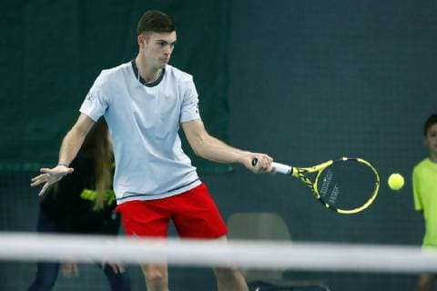 Tennis Showfight by Florian Mayer against Maximilian Marterer in tennis hall green-white in Bayreuth tennis player Maximilian Marterer