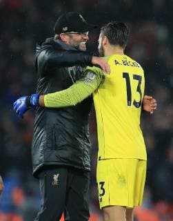 16th December 2018, Anfield, Liverpool, England; EPL Premier League football, Liverpool versus Manchester United ManU a delighted Liverpool manager Jurgen Klopp embraces Liverpool goalkeeper Alisson Becker at the end of the match  ActionPlus12088572 DavidxBlunsden