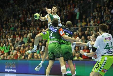 19 12 2018 xcsx Handball DHB Pokal SC Magdeburg Frisch Auf Goeppingen emspor v l Sebastian Heymann Frisch Auf Göppingen during an attempt to throw over the wall DFL DFB REGULATIONS PROHIBIT ANY USE OF PHOTOGRAPHS as IMAGE SEQUENCES and or QUASI VIDEO Magdeburg