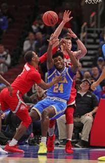 December 22, 2018 - Chicago, Illinois, U.S - UCLA Bruins guard Jalen Hill (24) battles for the ball in game action during the CBS Sports Classic at the United Center in Chicago, Illinois. NCAA College League USA 2018: UCLA vs. Ohio State - ZUMAh109 20181222_zaf_h109_004 Copyright: xWesxHightx