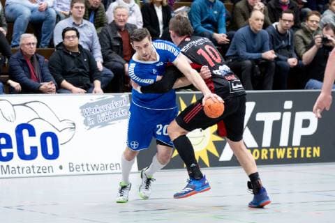 Luebbecke Germany 26 12 2018 2 Handball Bundesliga 2018 2019 TuS N Luebbecke vs TSV Bayer Dormagen L R Nuno Rebelo Dormagen Lukasz Gierak Luebbecke Luebbecke Nordrhein Westfalen Germany Merkur Arena