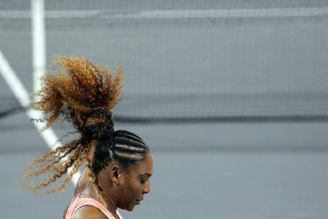 (181228) -- ABU DHABI, Dec. 28, 2018 (Xinhua) -- Serena Williams of the United States reacts during the match against her sister Venus Williams at the 2018 Mubadala World Tennis Championship in Abu Dhabi, the United Arab Emirates (UAE), on Dec. 27, 2018. Serena Williams lost 1-2. (Xinhua Mahmoud Khaled) (SP)UAE-ABU DHABI-TENNIS-MUBADALA WORLD TENNIS CHAMPIONSHIP 
