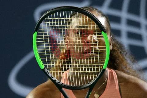 (181228) -- ABU DHABI, Dec. 28, 2018 (Xinhua) -- Serena Williams of the United States reacts during the match against her sister Venus Williams at the 2018 Mubadala World Tennis Championship in Abu Dhabi, the United Arab Emirates (UAE), on Dec. 27, 2018. Serena Williams lost 1-2. (Xinhua Mahmoud Khaled) (SP)UAE-ABU DHABI-TENNIS-MUBADALA WORLD TENNIS CHAMPIONSHIP 