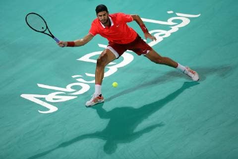 (181228) -- ABU DHABI, Dec. 28, 2018 (Xinhua) -- Karen Khachanov of Russia competes during his match against Dominic Thiem of Austria at the 2018 Mubadala World Tennis Championship in Abu Dhabi, the United Arab Emirates (UAE), on Dec. 27, 2018. Karen Khachanov won 2-0. (Xinhua Mahmoud Khaled) (SP)UAE-ABU DHABI-TENNIS-MUBADALA WORLD TENNIS CHAMPIONSHIP 