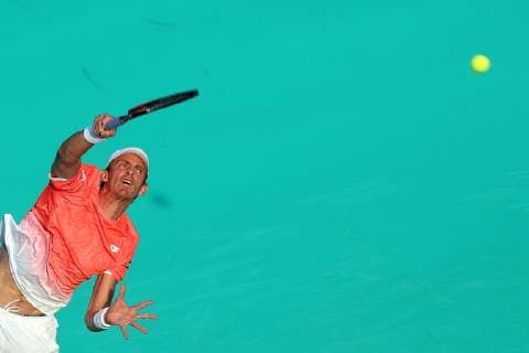 (181228) -- ABU DHABI, Dec. 28, 2018 (Xinhua) -- Kevin Anderson of South Africa returns the ball during his match against Hyeon Chung of South Korea at the 2018 Mubadala World Tennis Championship in Abu Dhabi, the United Arab Emirates (UAE), on Dec. 27, 2018. Kevin Anderson won 2-1. (Xinhua Mahmoud Khaled) (SP)UAE-ABU DHABI-TENNIS-MUBADALA WORLD TENNIS CHAMPIONSHIP 