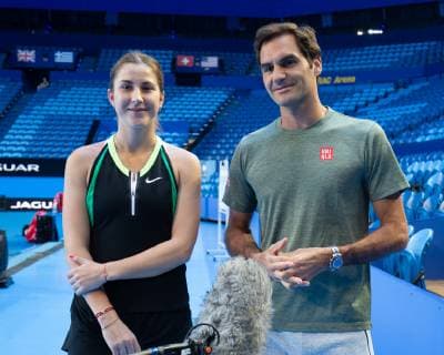 Belinda Bencic and Roger Federer give a TV interview Mixed Doubles Copyright: xJuergenxHasenkopfx