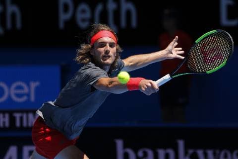 29th December 2018, RAC Arena, Perth, Australia; Hopman Cup Tennis, sponsored by Mastercard; Stefanos Tsitsipas of Team Greece reaches for a return of serve during his match against Cameron Norrie of Team Great Britain  ActionPlus12090990 DavidxWoodley