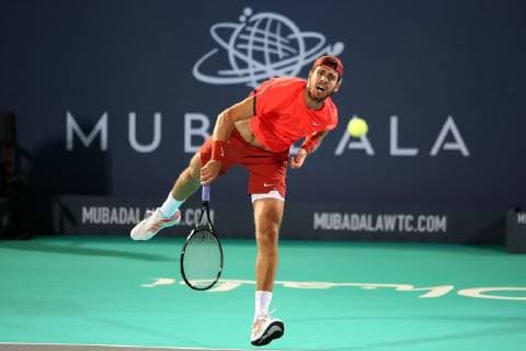 (181229) -- ABU DHABI, Dec. 29, 2018 (Xinhua) -- Karen Khachanov of Russia returns to Novak Djokovic of Serbia during the 2018 Mubadala World Tennis Championship in Abu Dhabi, the United Arab Emirates (UAE), on Dec. 28, 2018. Novak Djokovic won 2-0. (Xinhua Mahmoud Khaled) (SP)UAE-ABU DHABI-TENNIS-MUBADALA WORLD TENNIS CHAMPIONSHIP 