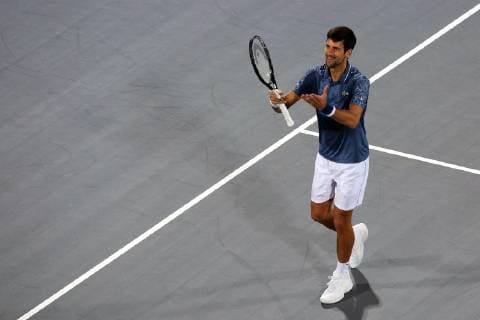 (181229) -- ABU DHABI, Dec. 29, 2018 (Xinhua) -- Novak Djokovic of Serbia reacts during the match against Karen Khachanov of Russia during the 2018 Mubadala World Tennis Championship in Abu Dhabi, the United Arab Emirates (UAE), on Dec. 28, 2018. Novak Djokovic won 2-0. (Xinhua Mahmoud Khaled) (SP)UAE-ABU DHABI-TENNIS-MUBADALA WORLD TENNIS CHAMPIONSHIP 